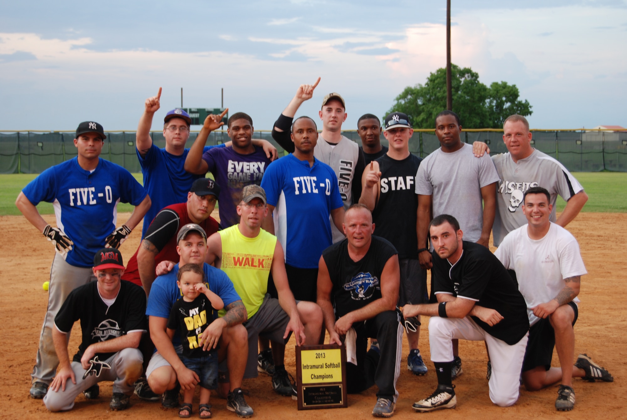 The 42nd Security Forces Squadron Defenders enjoy the spotlight after winning the intramural softball championship with a dramatic 5-4 victory over the Air Force Life Cycle Management Center. (courtesy photo)