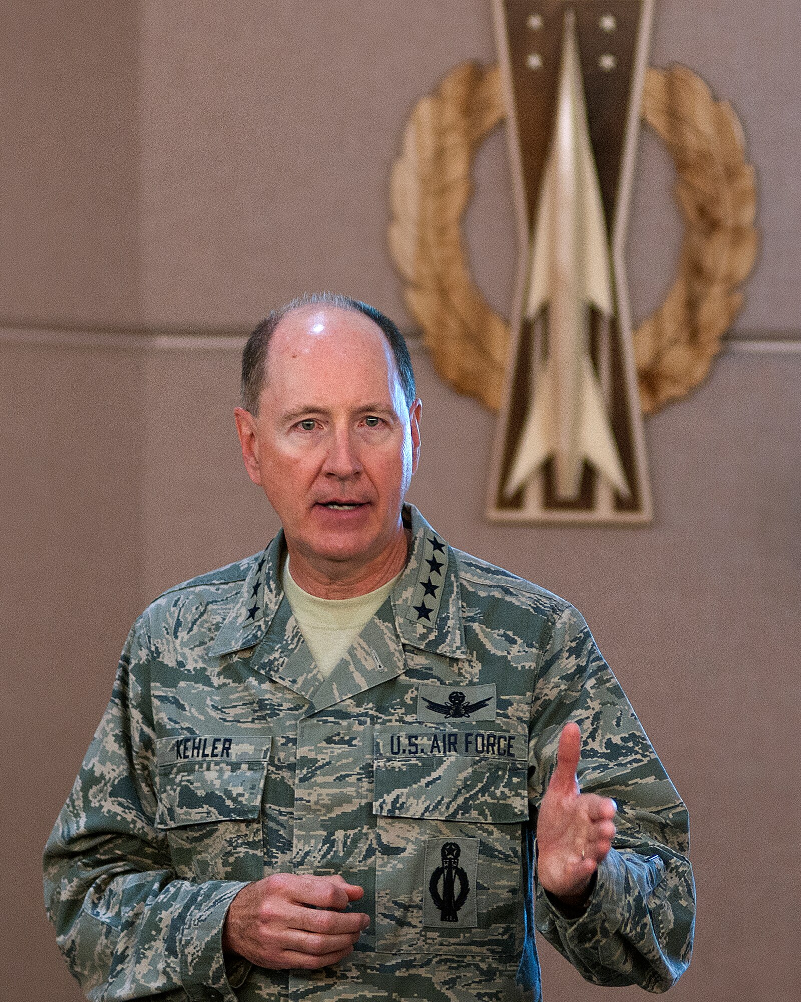 Gen. C. Robert Kehler, U.S. Strategic Command commander, addresses 90th Operations Group missile crew members on F.E. Warren Air Force Base, Wyo., July 30, 2013, prior to their departure out to the field. Kehler stressed the importance of their jobs and the confidence the national command structure has in their abilities. (U.S. Air Force photo by R.J. Oriez)