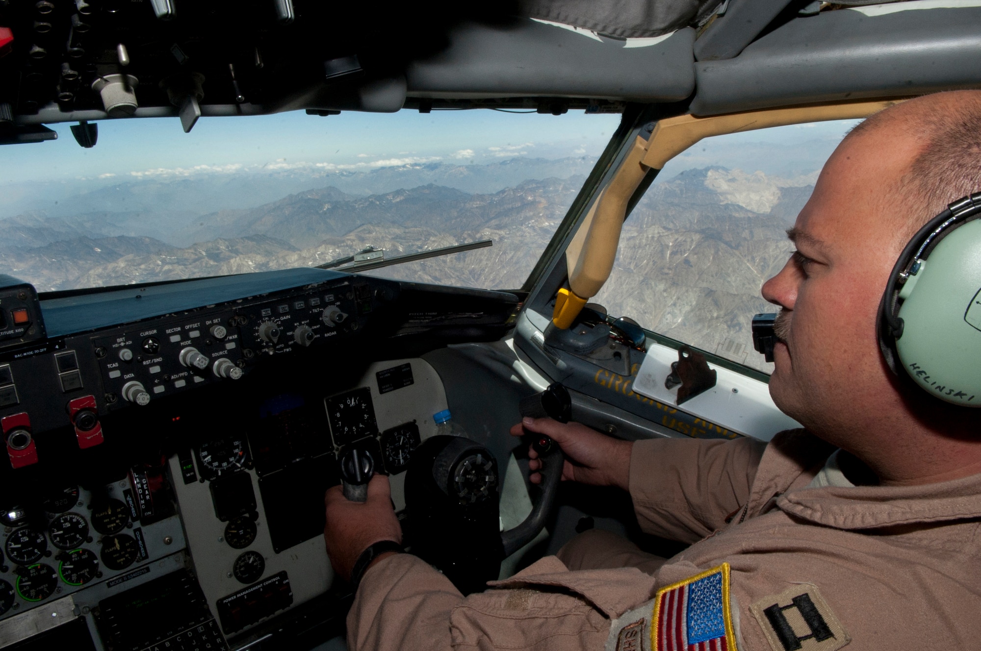 Capt. Brent Helinski, 22nd Expeditionary Air Refueling Squadron, pilots a KC-135 Stratotanker over Afghanistan July 25, 2013. Helinksi has flown more than 500 combat and combat support sorties in the refueling aircraft. (U.S. Air Force photo/Staff Sgt. Robert Barnett)