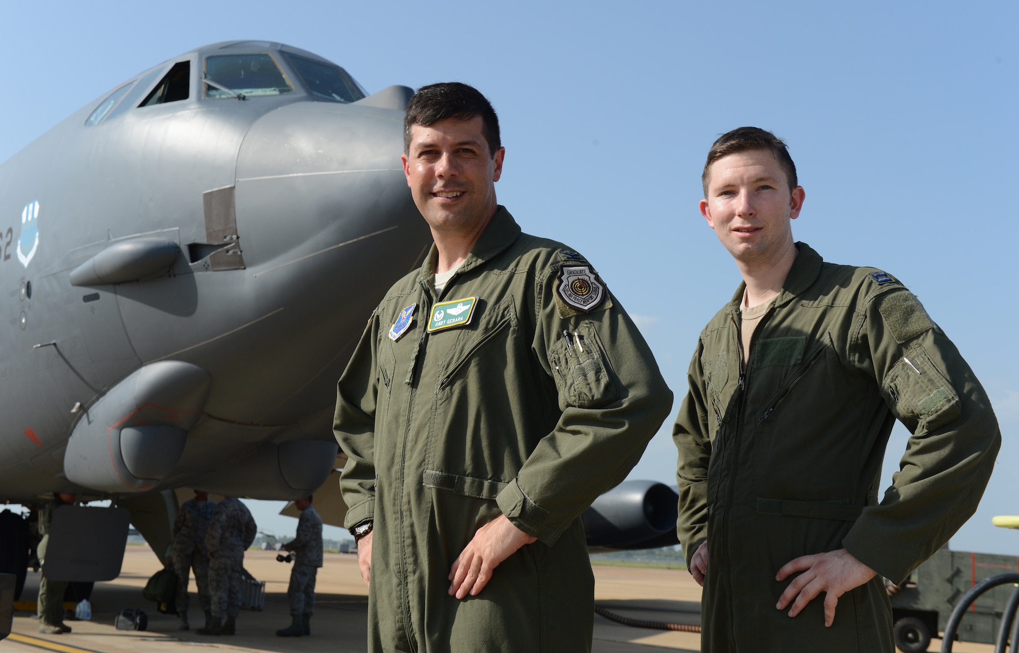 Col. Andrew Gebara, 2nd Bomb Wing commander, and Capt. Kasey Newcomer, 96th Bomb Squadron electronic warfare officer, stand in front of a B-52H Stratofortress on Barksdale Air Force Base, La., July 29, 2013. Newcomer was in grade school when Gebara took his first flight in the B-52 20 years ago. (U.S. Air Force photo/Senior Airman Micaiah Anthony)
