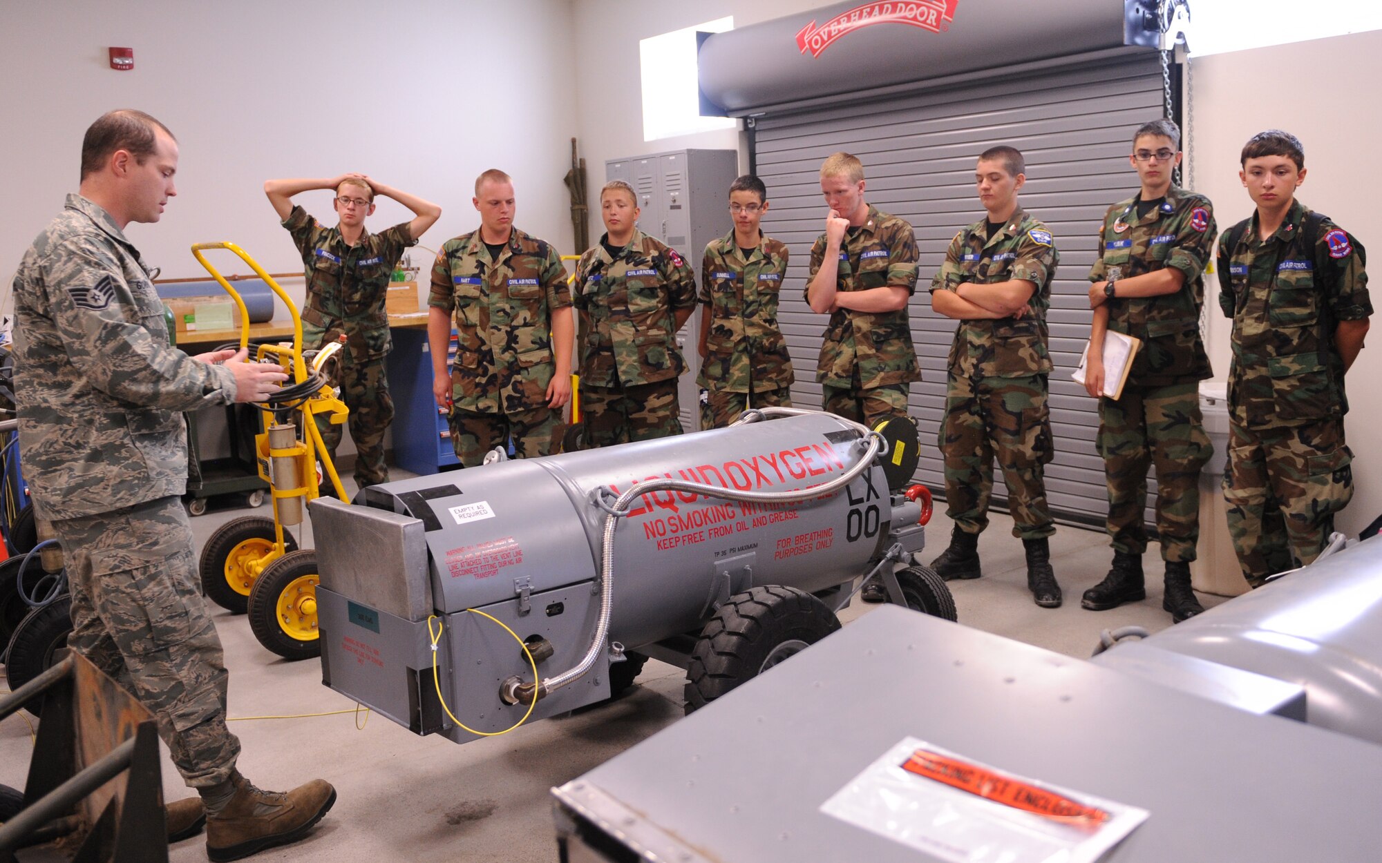 During a base tour, students with Civil Air Patrol enjoy a demonstration July 24, 2013, Mountain Home Air Force Base, Idaho. The students were able to see many aspects of MHAFB. (U.S. Air Force photo by Airman 1st Class Malissa Lott/ Released)