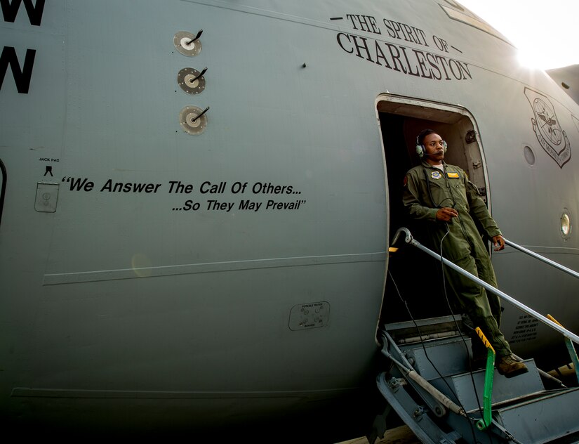 Airman 1st Class Trae Williams, 16th Airlift Squadron loadmaster, exits a C-17 Globemaster III July 30, 2013, at Joint Base Charleston – Air Base. S.C. (U.S. Air Force photo/ Senior Airman Dennis Sloan)