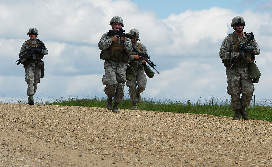The Convoy Response Force personnel assigned to the 91st Security Forces Group recently participated in numerous required exercises to validate tactics, techniques, and procedures in the event of real world incidents. This particular exercise consisted of a Mission Category 1 movement to a missile site. While en route, a mock improvised explosive device was detonated disabling the command element’s vehicle, creating an impassable road separating the rear response elements from the resource vehicle. CRF personnel swiftly assaulted, recaptured and secured the resource from enemy personnel. (U.S. Air Force photo/Airman 1st Class Kristoffer Kaubisch)