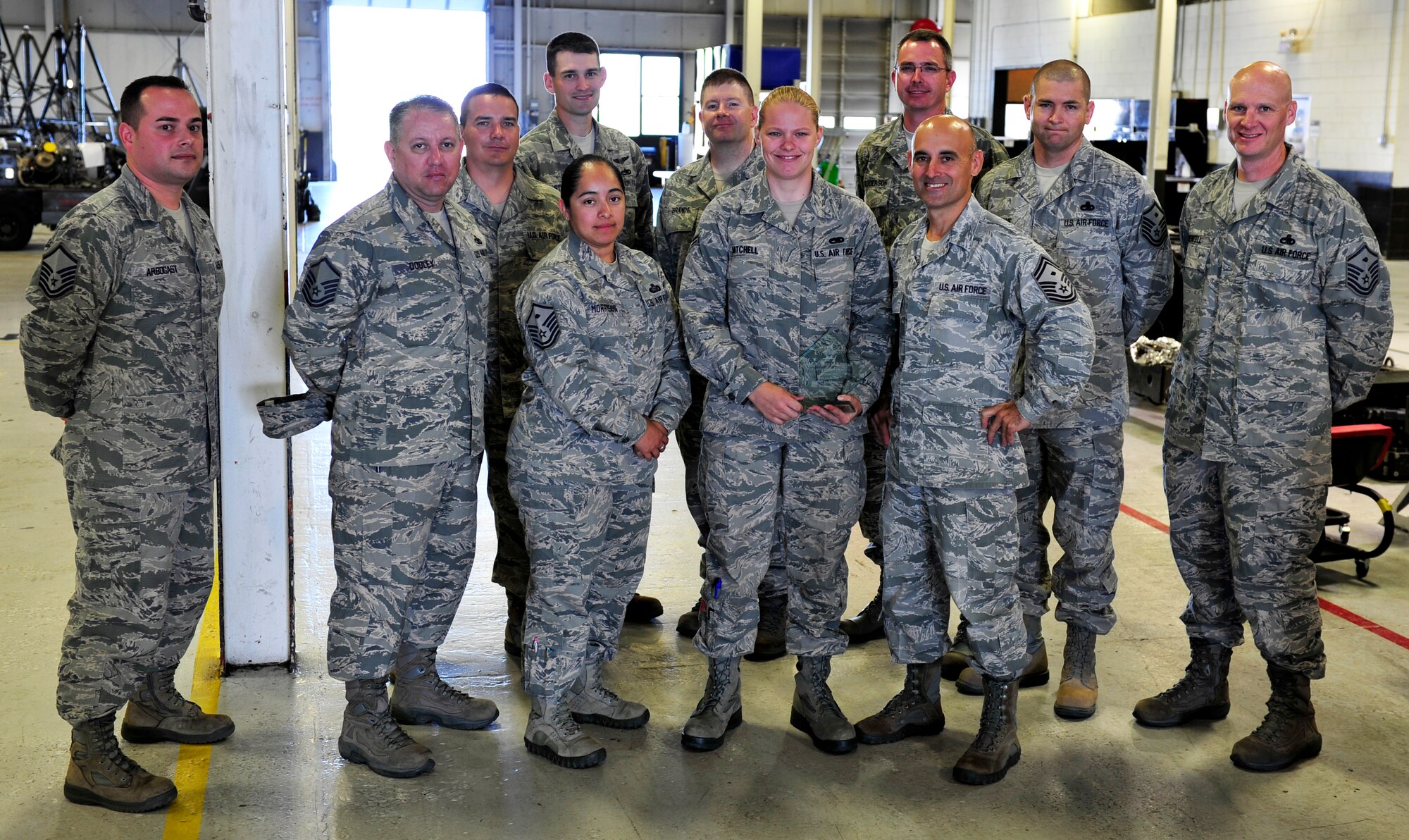 Airman 1st Class Megan Mitchell, assigned to the 5th Maintenance Squadron, earned the Diamond Sharp Award, July 24, 2013. Mitchell is currently a Dorm Resident Advisor. She earned the award for doing an outstanding job taking care of the Airmen in her dorm. She is always on top of dorm issues helping enforce dormitory standards. Mitchell has gone above and beyond keeping the first sergeants aware of concerns including quality of life matters. She has been in integral part of keeping morale high for the members who live in Dorm 276 and she has proven to be a great leader the first sergeants can count on. (U.S. Air Force photo/Airman 1st Class Kristoffer Kaubisch)