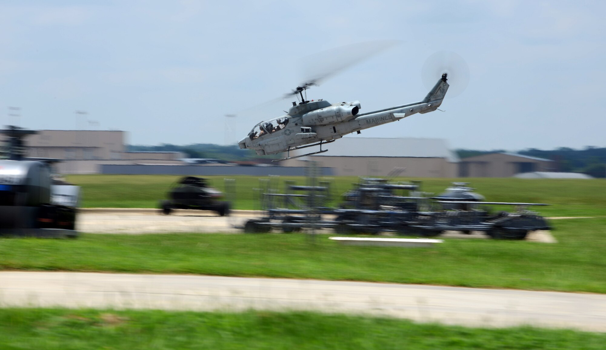 Pilots with Marine Light Attack Helicopter Squadron 773, the Marine Corps Reserves’ only attack helicopter squadron, take an AH-1W Super Cobra out for a test flight July 25. The Robins detachment is one of three in HMLA-773; the others are located in Louisiana and New Jersey. The "Red Dogs" squadron includes AH-1W Super Cobra attack helicopters and UH-1N Huey utility helicopters, which perform close support functions both overseas and stateside. HMLA-773 falls under the command of Marine Aircraft Group 49, also at Robins, and is part of the 4th Marine Aircraft Wing. Both units relocated to Robins in June 2010. (U.S. Air Force photo by Tommie Horton)