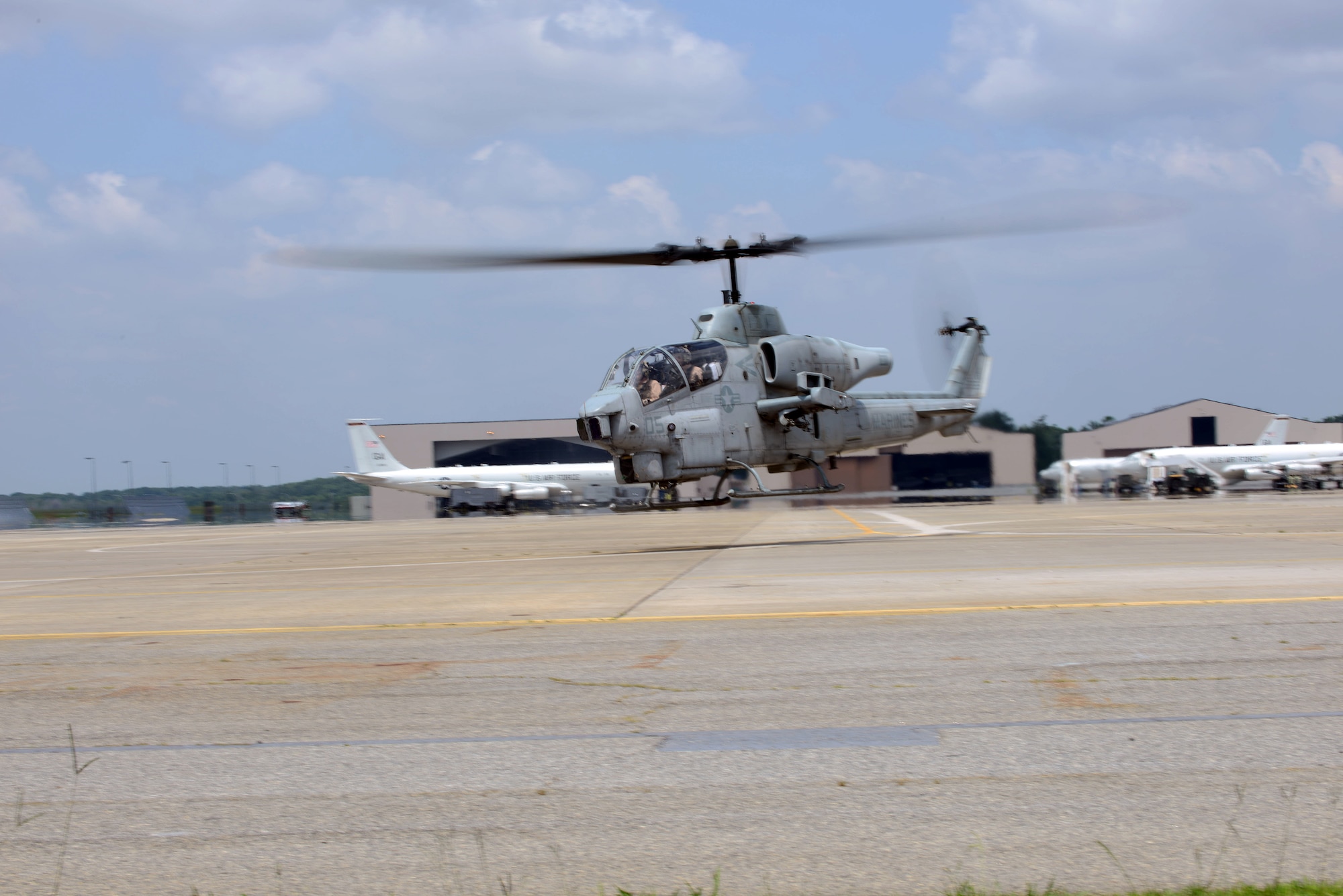 Pilots with Marine Light Attack Helicopter Squadron 773, the Marine Corps Reserves’ only attack helicopter squadron, take an AH-1W Super Cobra out for a test flight July 25. The Robins detachment is one of three in HMLA-773; the others are located in Louisiana and New Jersey. The "Red Dogs" squadron includes AH-1W Super Cobra attack helicopters and UH-1N Huey utility helicopters, which perform close support functions both overseas and stateside. HMLA-773 falls under the command of Marine Aircraft Group 49, also at Robins, and is part of the 4th Marine Aircraft Wing. Both units relocated to Robins in June 2010. (U.S. Air Force photo by Tommie Horton)