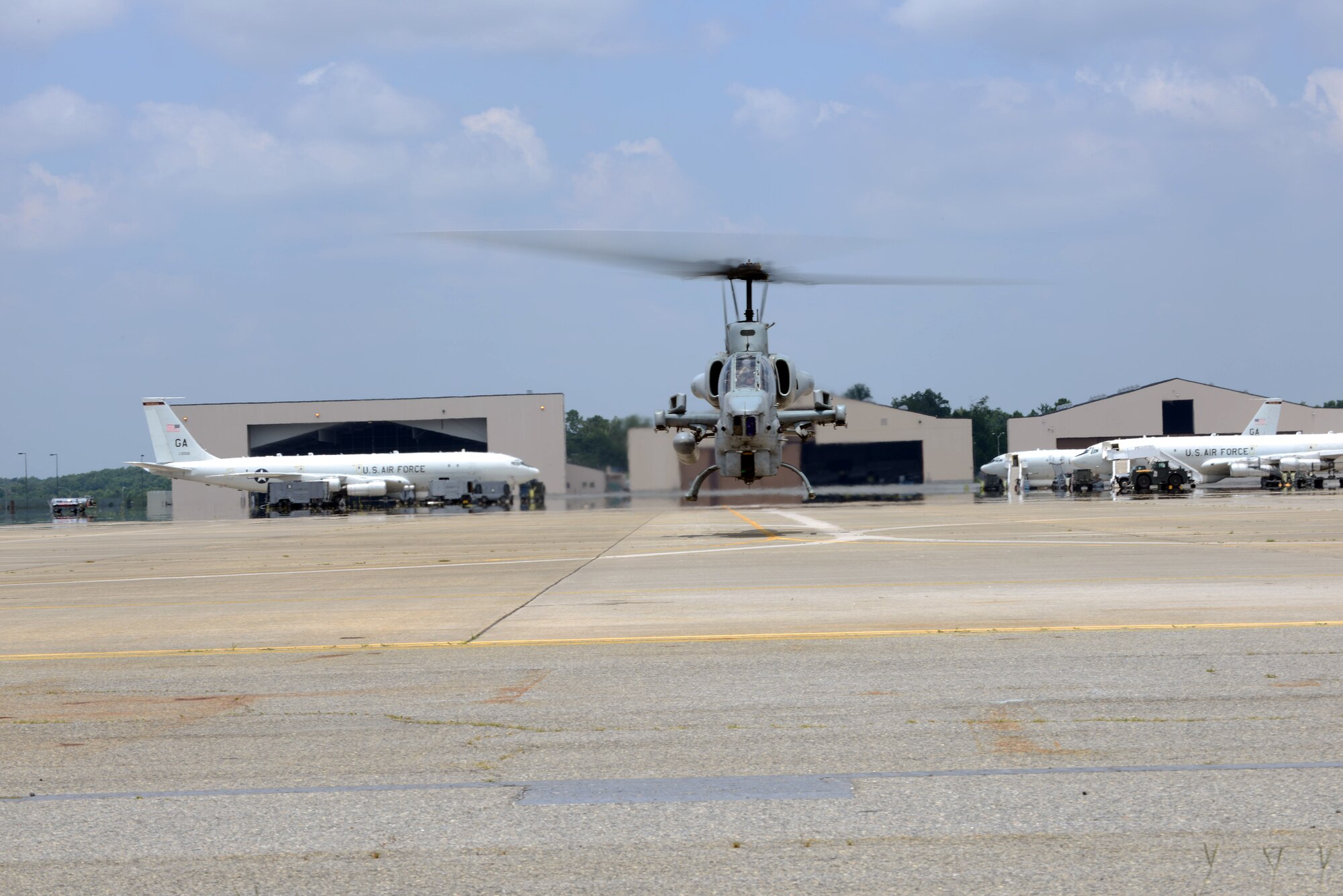 Pilots with Marine Light Attack Helicopter Squadron 773, the Marine Corps Reserves’ only attack helicopter squadron, take an AH-1W Super Cobra out for a test flight July 25. The Robins detachment is one of three in HMLA-773; the others are located in Louisiana and New Jersey. The "Red Dogs" squadron includes AH-1W Super Cobra attack helicopters and UH-1N Huey utility helicopters, which perform close support functions both overseas and stateside. HMLA-773 falls under the command of Marine Aircraft Group 49, also at Robins, and is part of the 4th Marine Aircraft Wing. Both units relocated to Robins in June 2010. (U.S. Air Force photo by Tommie Horton)