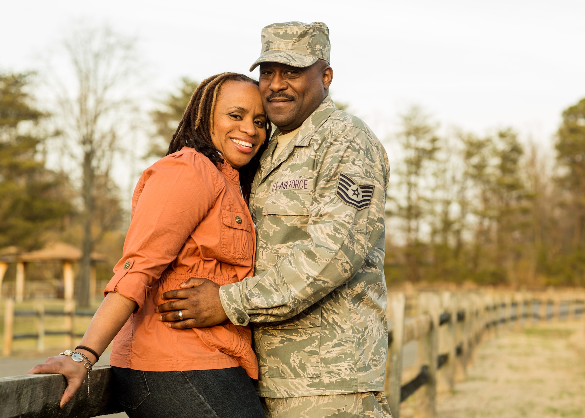 2013 Armed Forces Insurance Military Spouse of the Year, Alicia Hinds Ward poses with her husband, Technical Sgt. Edwinston Ward of the 113th Logistics Readiness Squadron, D.C. Air National Guard. (photo courtesy of Steven Voss)