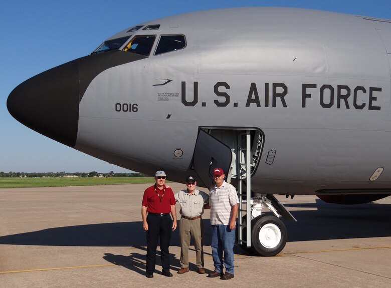 Retired Chief Master Sgt. Hank Dougherty, center, was reunited recently with this KC-135 Stratotanker, which he helped deliver to the Air Force 54 years ago shortly after it came off the assembly line. Accompanying their father for the occasion were sons Darrell Dougherty, left, and Keith Dougherty, right, of the 72nd Logistics Readiness Squadron. The tanker, #58-0016, was at Tinker for programmed depot maintenance. (Courtesy photo)