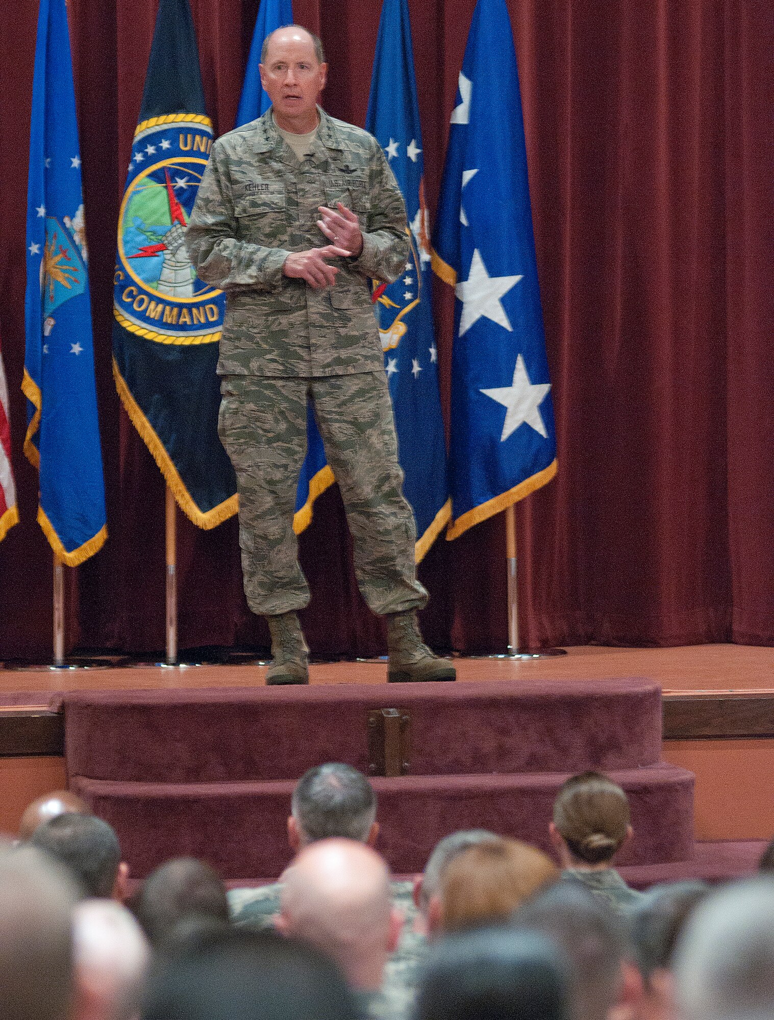 Gen. C. Robert Kehler, U.S. Strategic Command commander, addresses Airmen of the 90th Missile Wing during an all call in the F.E. Warren Air Force Base, Wyo., theater July 30, 2013. Kehler spoke of the future of the land-based ICBM force and stressed to the members of the Mighty Ninety the importance of their jobs and the confidence the national command structure has in their abilities. (U.S. Air Force photo by R.J. Oriez)