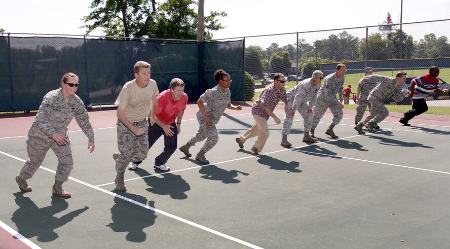 During the Bring your Kid to Work Day held on Dobbins Air Reserve Base, Ga., July 25, the kids of Reservists and Civilian personnel engaged in a game of dodge ball. (U.S. Air Force photo/Brad Fallin)