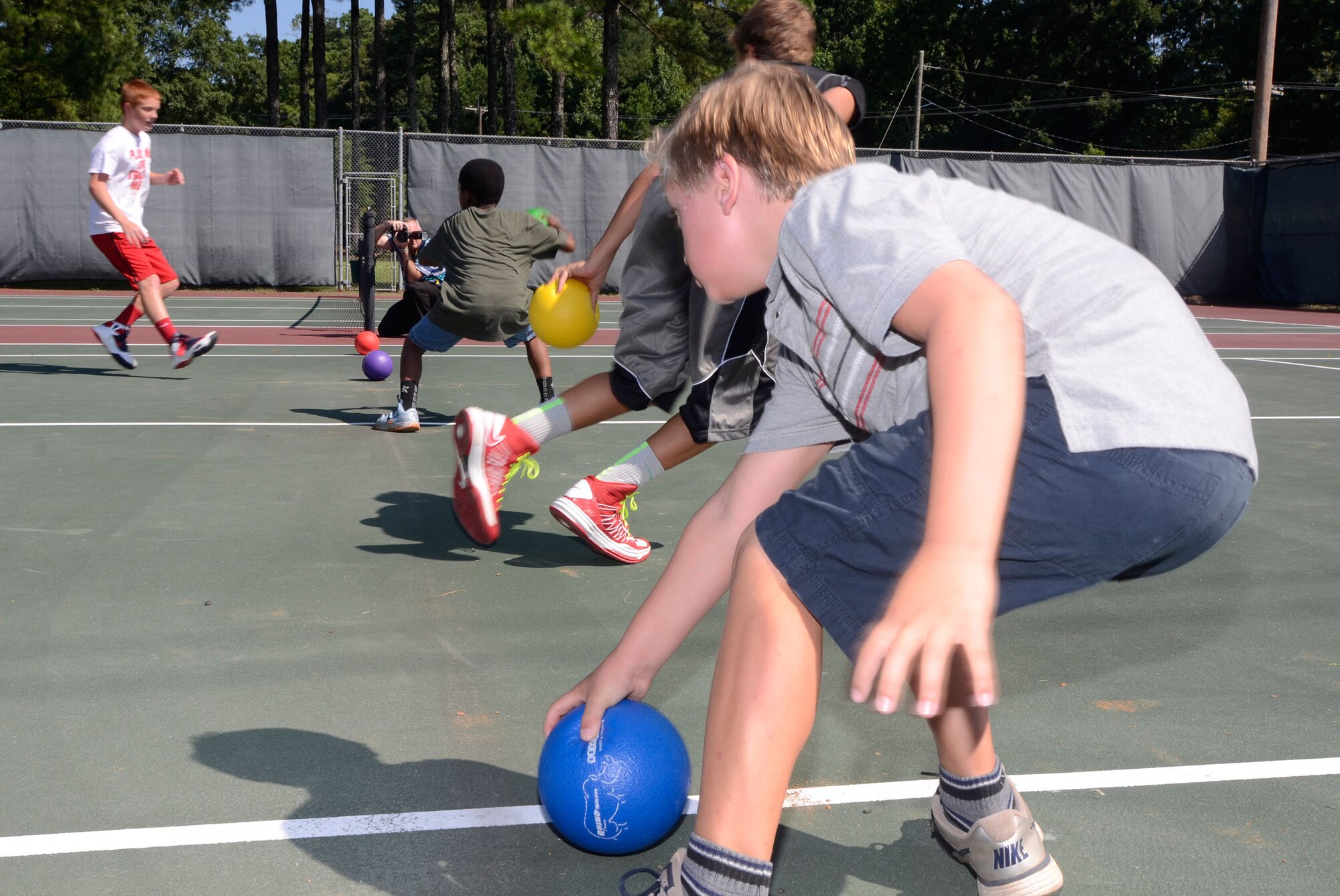 During the Bring your Kid to Work Day held on Dobbins Air Reserve Base, Ga., July 25, the kids of Reservists and Civilian personnel engaged in a game of dodge ball. (U.S. Air Force photo/Don Peek)