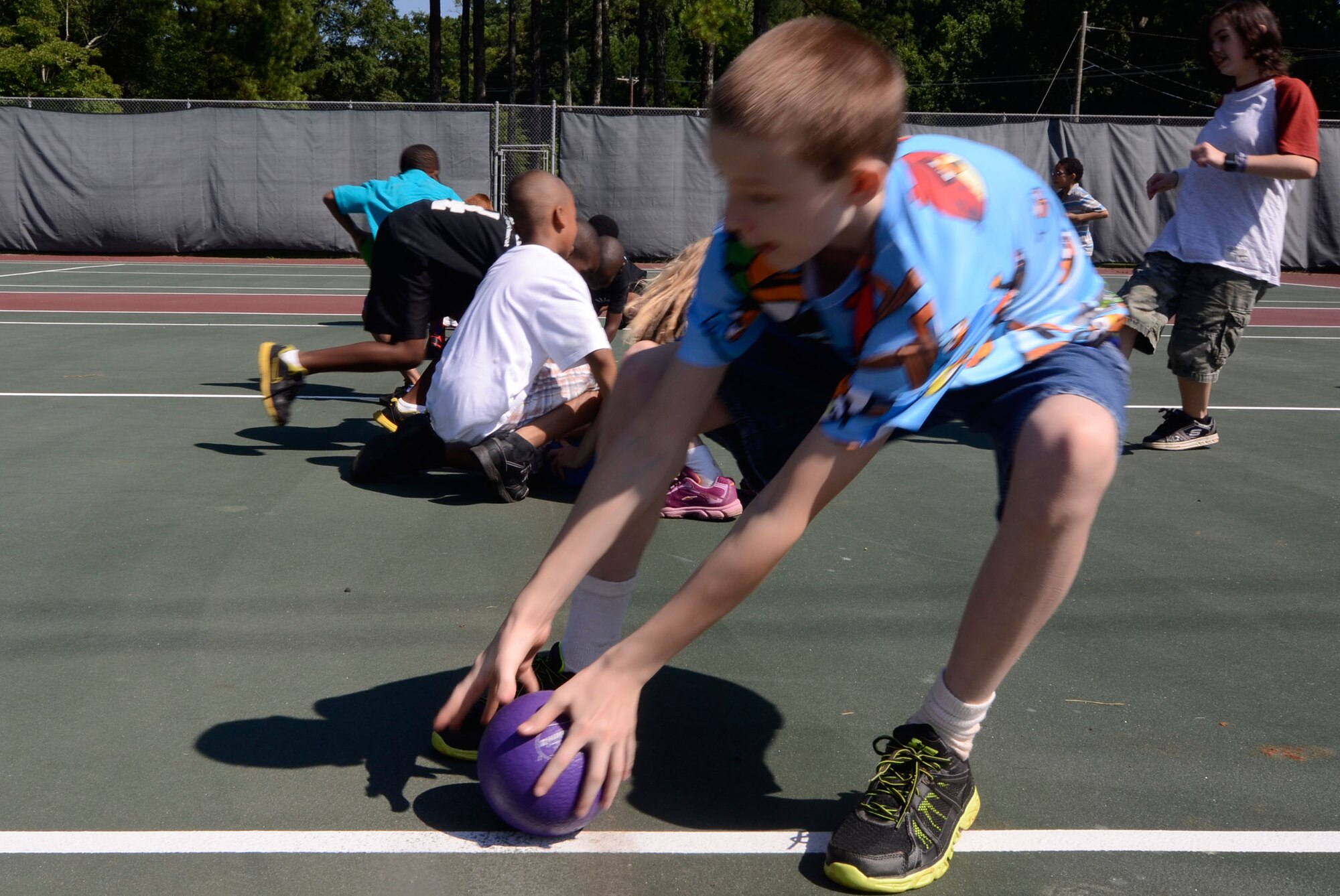 During the Bring your Kid to Work Day held on Dobbins Air Reserve Base, Ga., July 25, the kids of Reservists and Civilian personnel engaged in a game of dodge ball. (U.S. Air Force photo/Don Peek)