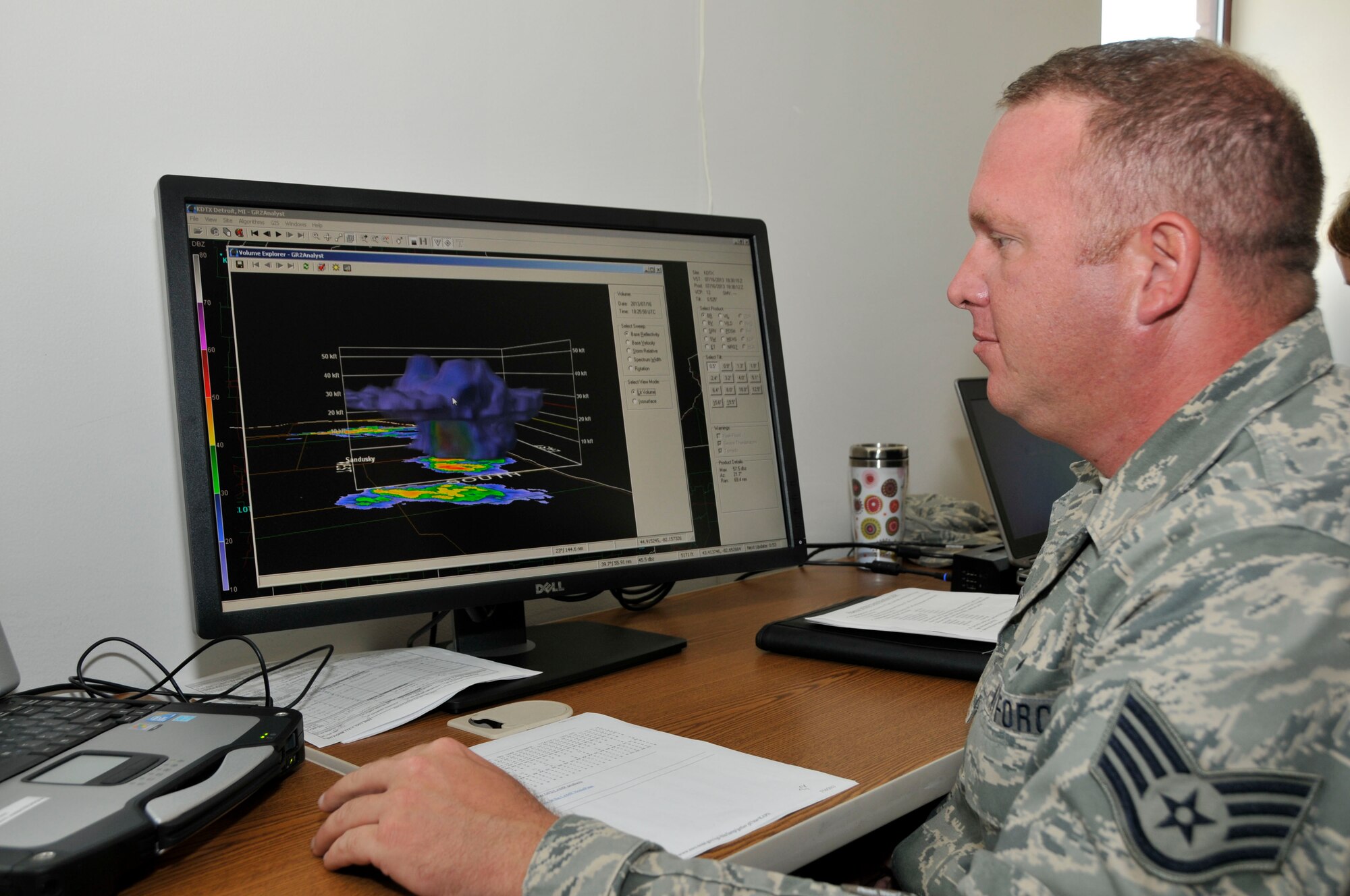 U.S. Air Force Staff Sgt. Brad Simon, Indiana Air National Guard, 181st Intelligence Wing, 113th Weather Flight forecaster on duty analyzes weather conditions during annual training July 16, 2013, at the Combat Readiness Training Center, Alpena, Mich. (U.S. Air National Guard photo by Senior Master Sgt. John S. Chapman/Released)