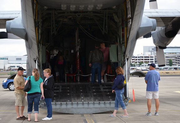 Visitors at the 304th Rescue Squadron reunion picnic check out a static display of an HC-130P/N from the 920th Rescue Wing, Fla., at Portland International Airport, Ore., July 28, 2013. The 304th Rescue Squadron is a geographically separated unit of the 920th Rescue Wing.  (U.S. Air Force photo/Tech. Sgt. Anna-Marie Wyant)