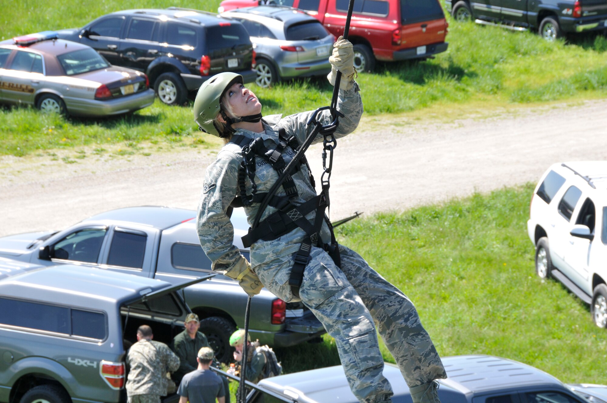U.S. Air Force Airman 1st Class Candace M. Cutler, 181st Intelligence Wing, Security Forces Squadron, repels off a 40 foot tower at Camp Atterbury, Edinburgh, Ind., on May 14, 2013. Security Forces went to participate in multi-agency law enforcement training event which promotes better communications between agencies and allows for additional skill sets directly related to the Air National Guard's missions of Homeland Security and Domestic Operations.  (U.S. Air National Guard photo by Senior Master Sgt. John S. Chapman/Released)