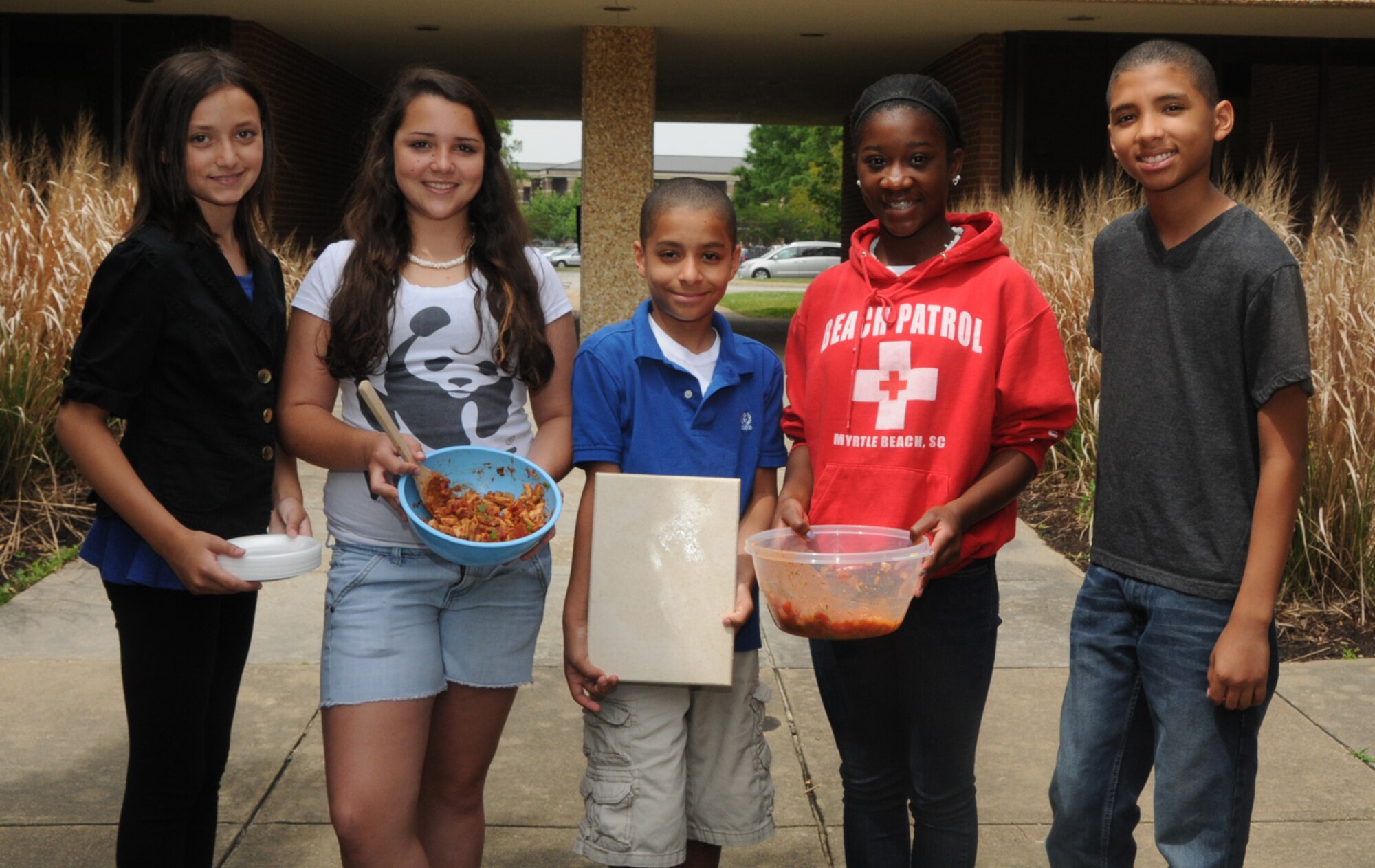 192D Fighter Wing Guard Kids took part in an Air Force Teen Council challenge where they created a dish that deployed airman could make and eat in the field. With help from some our “Cajun” Guard Family members, this group of master chef’s came up with "Raptor Jambalaya!" They blended only the best “MRE” ingredients along with a few off the shelf spices and items creating a flavorful dish in only 20 minutes. 

The master chef’s included (from left) Syndey Price, daughter of MSgt Kristy Price, Kiersten Wark, Daughter of Col. Keith Wark, Alex Dumas, son of TSgt Rick Dumas, Danielle Wolfe, daughter of MSgt. Teresa Wolfe and Rick Dumas Jr, son of TSgt Rick Dumas. These 192D junior chefs’s designed the recipe, blended the items, put together a video of the adventure and enjoyed eating the spicy dish!
