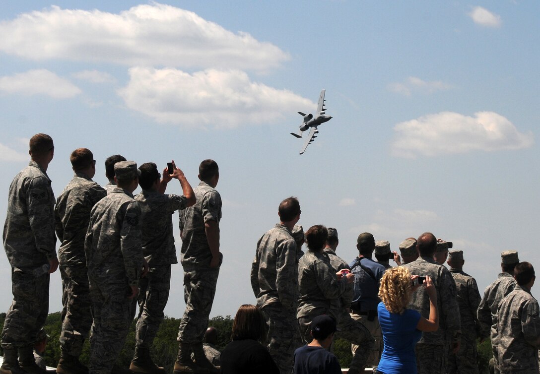 188th Fighter Wing Airmen, families and friends enjoy the 184th Fighter Squadron's "turkey shoot," a competition among pilots consisting of precision bombing and strafing runs at Razorback Range, Fort Chaffee, Ark. The competition, which doubled as a training exercise for the pilots, is likely to be the wing's final one, as 188th will be transitioning from the A-10C Thunderbolt II to a remotely piloted aircraft mission in 2014. (U.S. Air National Guard photo by Senior Airman John Hillier/188th Fighter Wing Public Affairs)