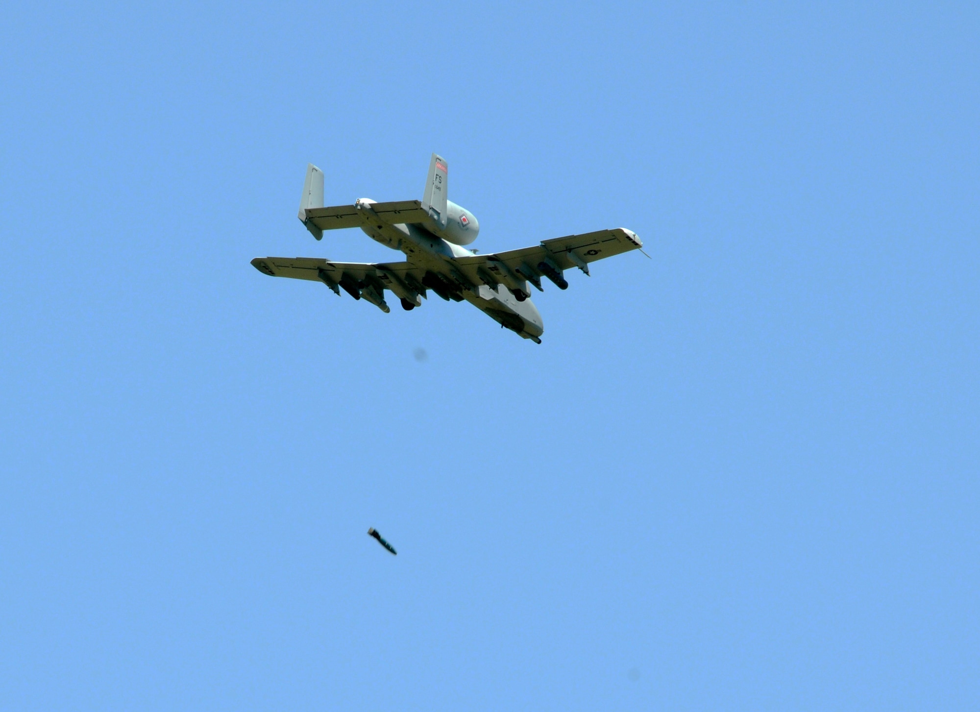 Maj. Andrew Vaughn, a pilot with the 188th Fighter Wing, competes in a "Turkey Shoot," a competition among pilots consisting of strafing and bomb drops at Razorback Range Detachment 1, May 13, 2013. This is the final such event as the 188th will be transitioning from the A-10C Thunderbolt II to a remotely piloted aircraft mission. (U.S. Air National Guard photo by Senior Airman Hannah Landeros/188th Fighter Wing Public Affairs)