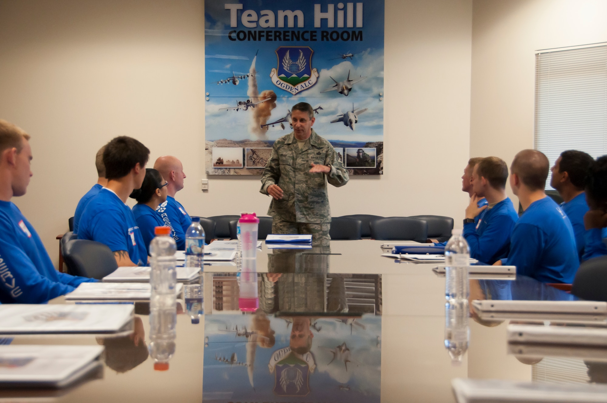 Command Chief Master Sgt. Carmen Madia talks with members of the Development Training Flight about his journey through the Reserve. Fresh from the pentagon, Madia joined the 419th on May 4. (U.S. Air Force photo/Senior Airman Crystal Charriere)