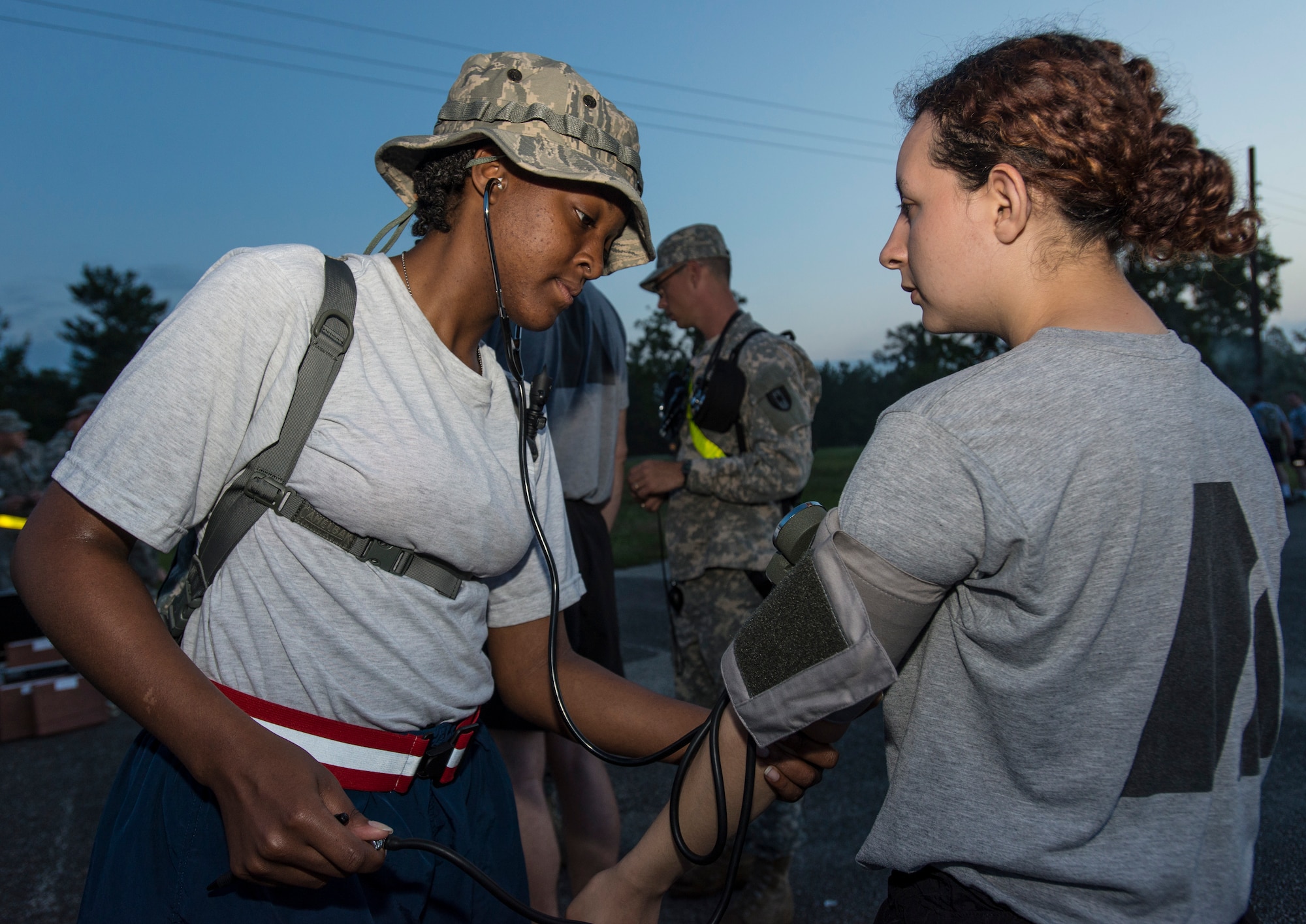 U.S. Air Force Airman 1st Class Jasmine Mitchell, a medical technician with the 116th Medical Group, Georgia Air National Guard, checks the blood pressure of Cpl. Marcerra Jordon, a chemical specialist with the 138th Chemical Company, Georgia National Guard, to ensure she is safe to participate in the day’s events during the Vigilant Guard 2013 exercise at Camp Blanding, Fla., May 21, 2013. The Medical Group from the 116th Air Control Wing, out of Robins Air Force Base, Ga., is a key component of the 78th Homeland Response Force set up to respond to disasters in the Southeast U.S. region. During the exercise, Guardsmen responded to various scenarios such as a plane crash, train derailment, hurricane, and an explosion at a chemical plant. (U.S. Air National Guard photo by Master Sgt. Roger Parsons/Released)