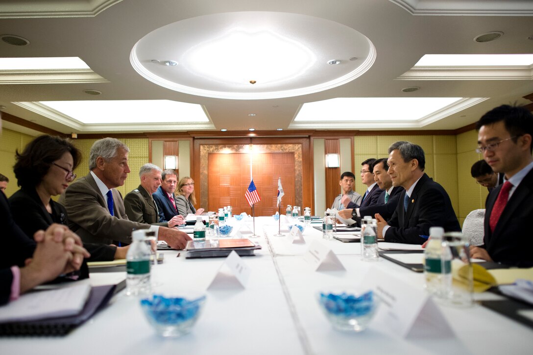 U.S. Defense Secretary Chuck Hagel meets with Korean National Defense Minister Kim Kwan-Jin at the Shangri-La Dialogue in Singapore, June 1, 2013. 