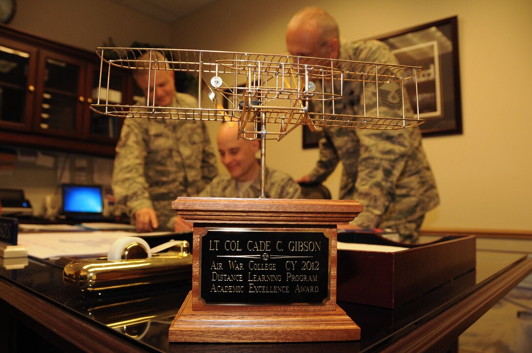 Lt. Col. Cade Gibson wins academic excellence award.
