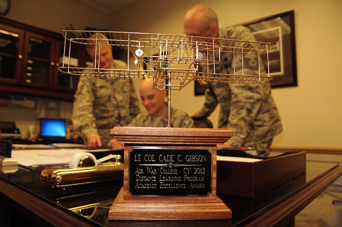 Lt. Col. Cade Gibson wins academic excellence award.