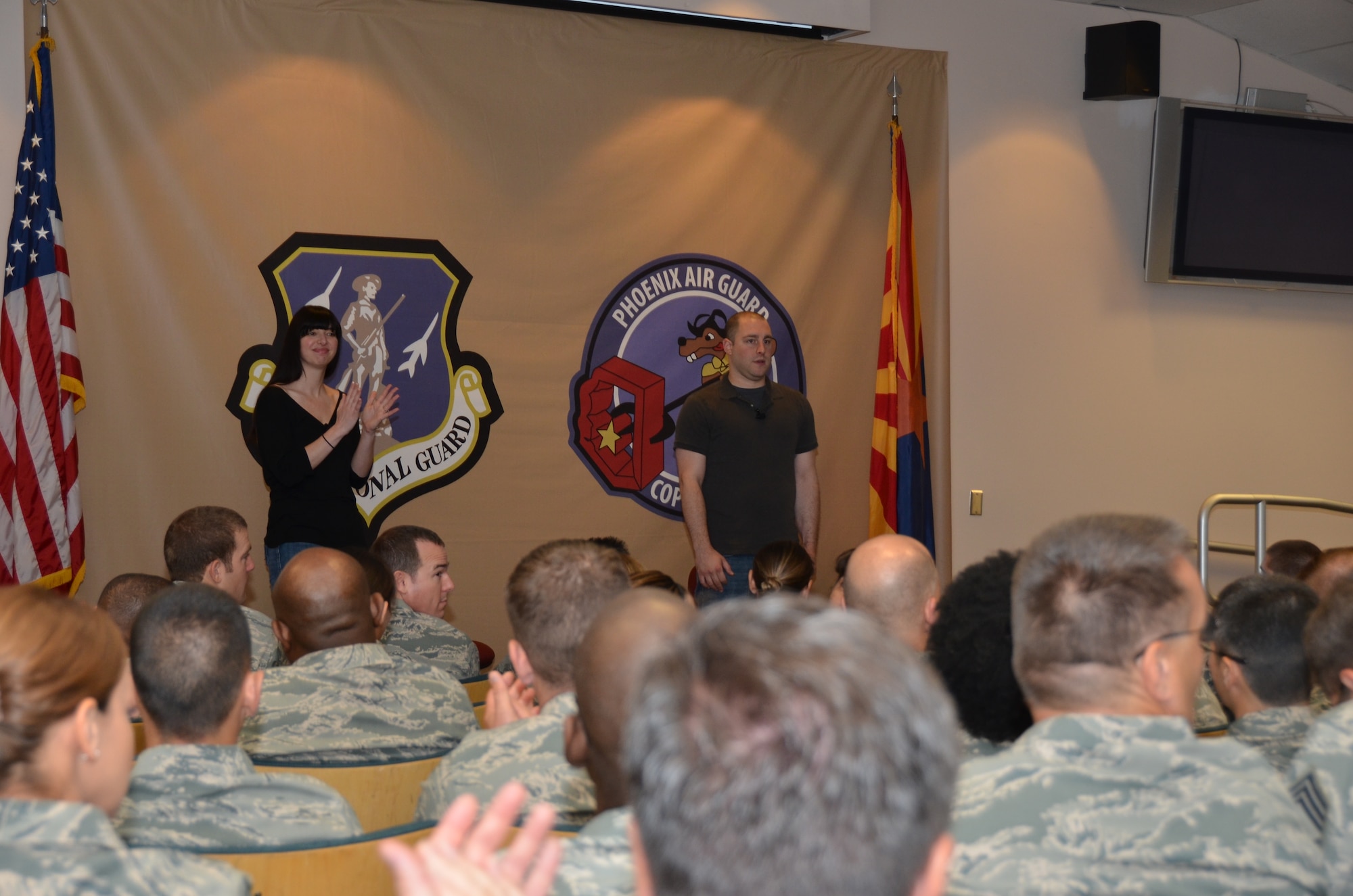 Airmen from the 161 Air Refueling Wing, Phoenix, attend the interactive improv show "Sex Signals" hosted by the 161 ARW Sexual Assault Prevention and Response Program on June 1, 2013. Actors Lindsey Pearlman and George Zerante focused on issues such as dating, sex, sexual assault and rape. (U.S. Air National Guard photo by SrA Joshua Morrison/Released)