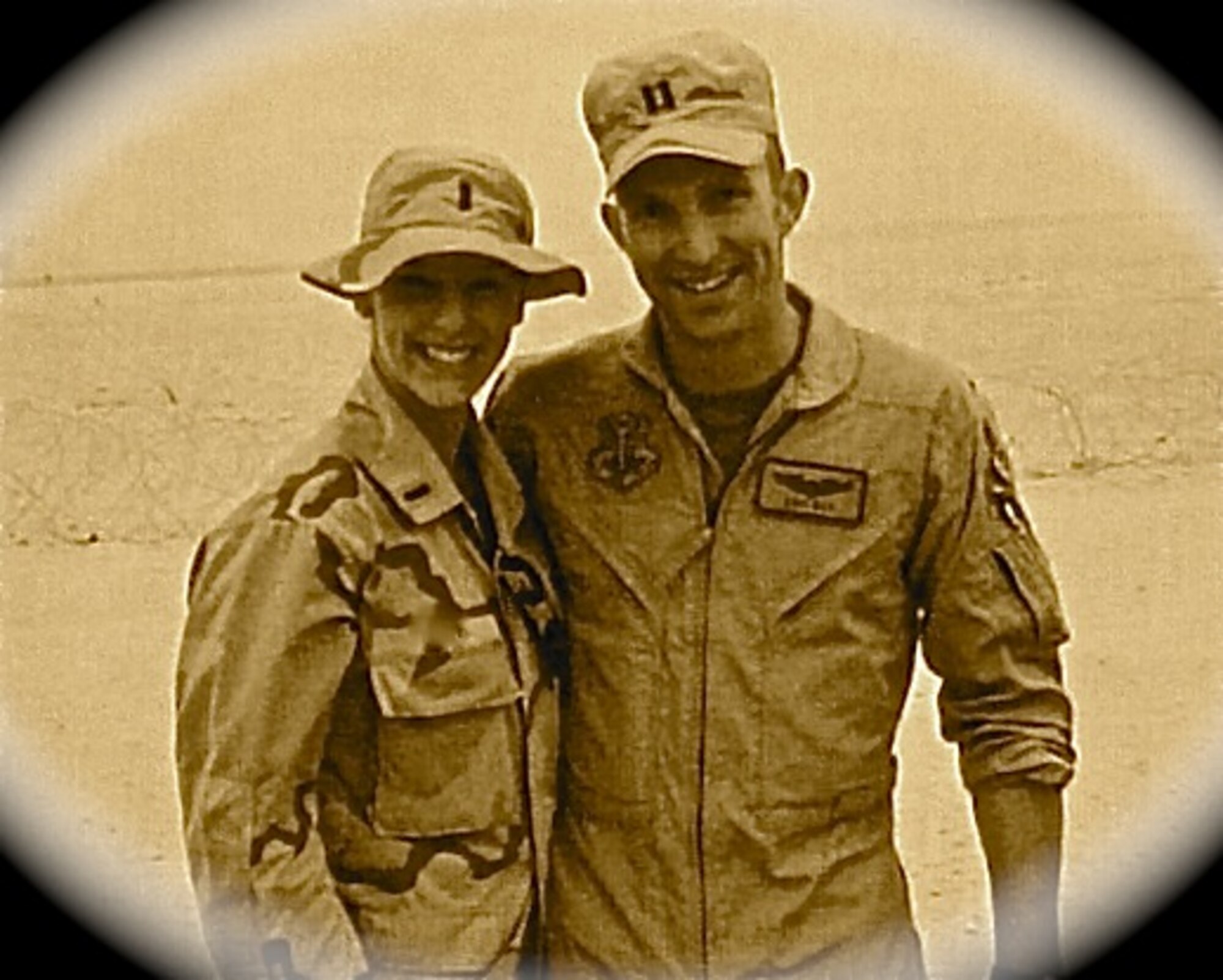 First Lt. N.C. Das and her husband Capt. Eric Das pose for a picture while deployed to Southwest Asia in 2003. This was the last picture taken of the couple before the F-15E he was flying crashed and killed him and his weapons systems officer Lt. Col. Bill Watkins April 7. (Courtesy photo illustration) 
