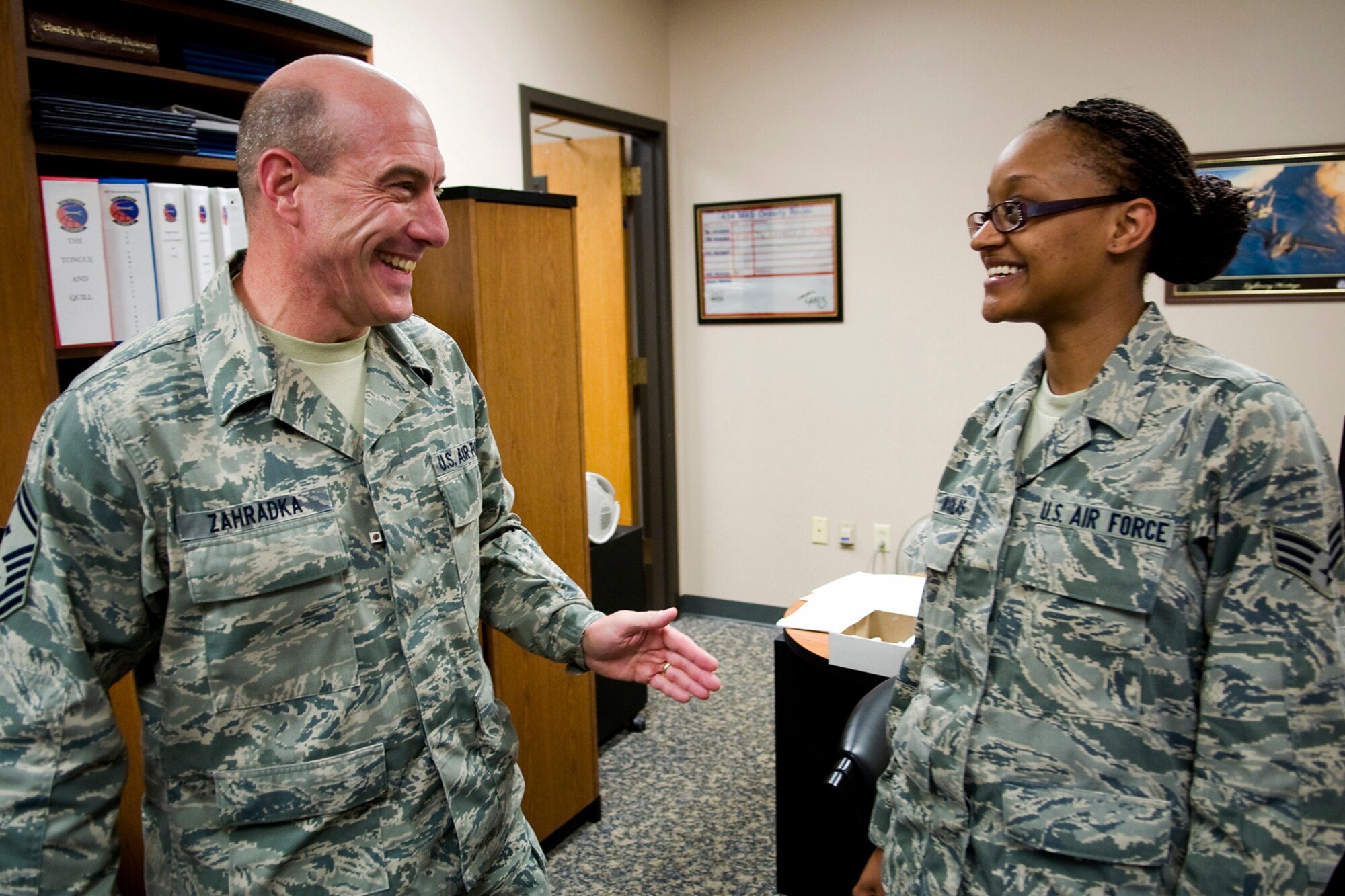 GRISSOM AIR RESERVE BASE, Ind. -- Senior Master Matthew Zahradka, 434th Maintenance Squadron first sergeant, talks with Senior Airman Jasmine Nicholas, 434th MXS personnel apprentice, here June 2. First sergeants help maintain good order and discipline within a unit while helping Airmen in both their military and civilian lives. (U.S. Air Force photo/Tech. Sgt. Mark R. W. Orders-Woempner) 