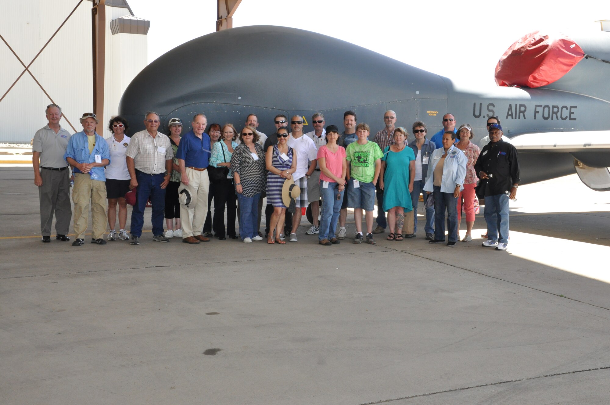 Employers and civic leaders stand in front of the RQ-4 Global Hawk during the ESGR tour.  Employers and civic leaders attended the annual ESGR tour at Beale during the June UTA. (U.S. Air Force photo Senior Airman Adam Hamar)