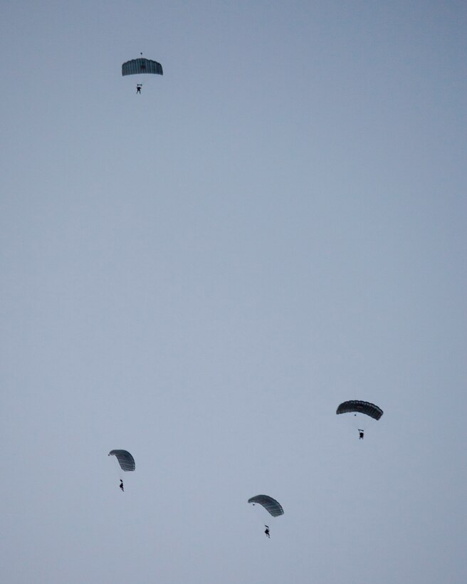 26th Marine Expeditionary Unit (MEU) Maritime Raid Force Marines conduct parachute operations over Djibouti, Africa, May 27, 2013. The 26th MEU is a Marine Air-Ground Task Force forward-deployed to the U.S. 5th Fleet area of responsibility aboard the Kearsarge Amphibious Ready Group serving as a sea-based, expeditionary crisis response force capable of conducting amphibious operations across the full range of military operations.(U.S. Marine Corps photo by Sgt. Christopher Q. Stone, 26th MEU Combat Camera/Released)
