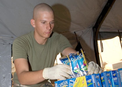 Lance Cpl. Cory Schultz from the 24th Foxtrot Company stationed at Camp Pendleton volunteers his time to help out stranded families at the evacuation center on Turner Field located on the Naval Amphibious Base Coronado. More than 400 military families from San Diego County and the surrounding areas take refuge from the wildfires struck several San Diego communities.  More than a quarter-million people were urged to flee their homes across Southern California as wildfires blown by fierce desert winds raced over the landscape with terrifying speed, destroying hundreds of structures, clogging highways, sending smoke and ash over a wide area. The numerous fires in San Diego County currently threaten no Navy facilities. The Navy is working with various agencies to aide in combating the fires and providing assistance to both military and civilians. 

U.S. Navy photo by Mass Communication 2nd Class Mark A. Leonesio
