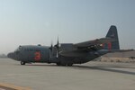 A C-130 turns to taxi at Channel Islands Air National Guard Station, Calif., on Oct. 25, 2007 in support of the California firefighting efforts. The U.S. Air Force Reserve and Air National Guard are participating in the Southern California firefighting effort. 