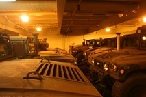 Humvees are parked and chained as tight as possible aboard the United States Naval Ship Dahl during a Marine Prepositioning Force Exercise conducted aboard Marine Corps Support Facility Blount Island, Fla., May 25, 2013. Marines from II Marine Expeditionary Force inspected the vehicles before unchaining them and offloading them onto navy lighterage vessels which then took them ashore. (U.S. Marine Corps photo by Lance Cpl. Shawn Valosin)