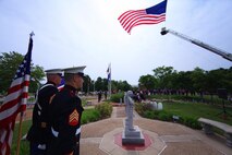 Marines with Recruiting Station St. Louis recognize veterans past and present during a Memorial Day Ceremony in St. Peters, Mo. During the ceremony 15 poolees were sworn into the United States Marine Corps. (U.S. Marine Corps photo by Cpl. Erik S. Brooks Jr.) 