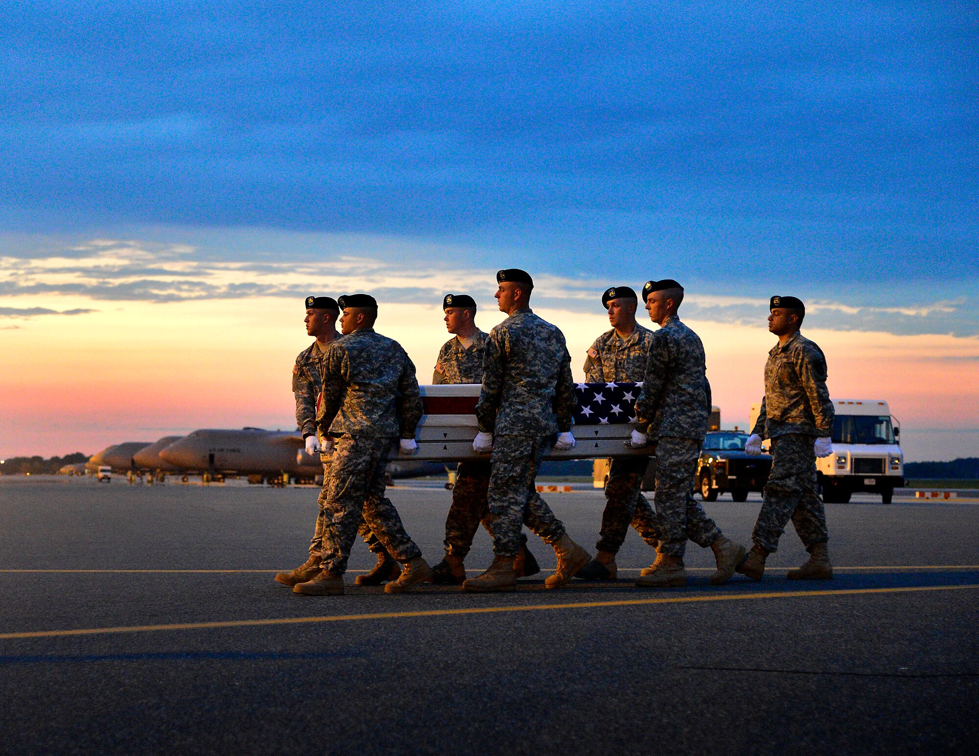 A U.S. Army carry team transfers the remains of Army Spc. Kyle P. Stoeckli of Moseley, Va., at Dover Air Force Base, Del., on June 3, 2013. Stoeckli was assigned to the 1st Battalion, 36th Infantry Regiment, 1st Stryker Brigade Combat Team, 1st Armored Division, Fort Bliss, Texas.  (U.S. Air Force photo/David Tucker)
