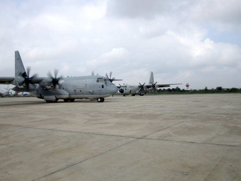 POCHENTONG AIR BASE, Cambodia -- A U.S. Marine Corps KC-130J from the 1st Marine Aircraft Wing, Marine Corps Air Station, Futenma, Japan, taxis on the runway here June 3, 2013, prior to its first flight in Pacific Airlift Rally 2013. U.S. servicemembers are participating in PAR13, which advances military airlift interoperability and cooperation between the nations of the Indo-Pacific region.  (U.S. Air Force photo/Capt. Chris Hoyler)