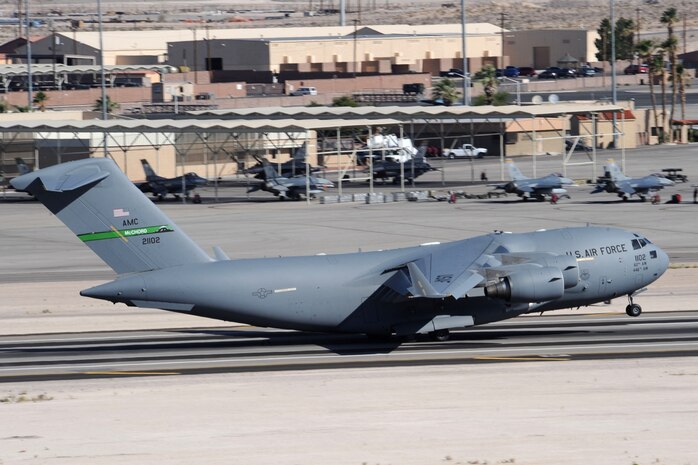 A C-17 Globemaster III from McChord Air Force Base, Wash. takes off during the start of the Joint Forcible Entry Exercise May 31, 2013, at Nellis AFB, Nev. JFEX is a U.S. Air Force Weapons School large-scale air mobility exercise in which students plan and execute a complex air-land operation on a simulated contested battlefield. (U.S. Air Force photo by Tech. Sgt. Taylor Worley)
