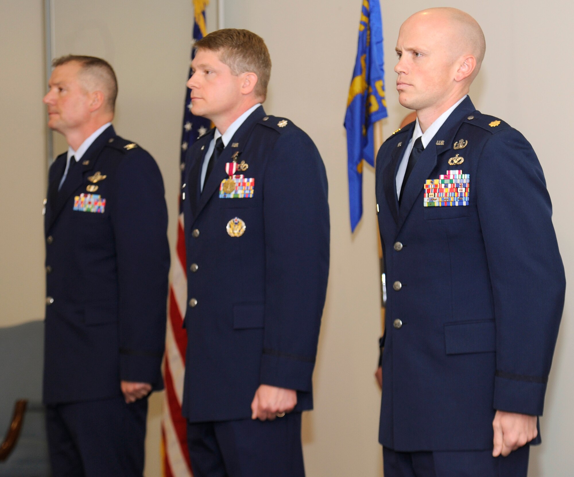 Maj. Kelly Hannum, 336th Training Squadron commander, prepares to assume command of the 336th Training Squadron during the Change of Command ceremony at Fairchild Air Force Base, Wash., May 31, 2013.  The change of command ceremony is a tradition that represents a formal transfer of authority and responsibility. (U.S. Air Force photo by Airman 1st Class Ryan Zeski)