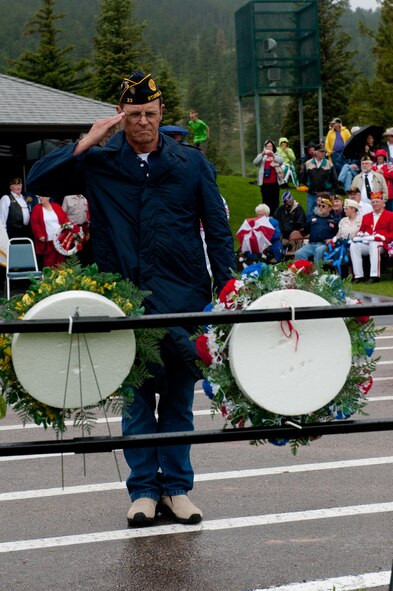 Jerry Lolley, American Legion Post 33 adjutant, salutes after laying a wreath during the Memorial Day Ceremony at the Black Hills National Cemetery in Sturgis, S.D., May 27, 2013. The ceremony was held to pay homage to all those who answered the nation’s call, and made the ultimate sacrifice in defense of our nation. (U.S. Air Force photo by Senior Airman Kate Maurer/Released)