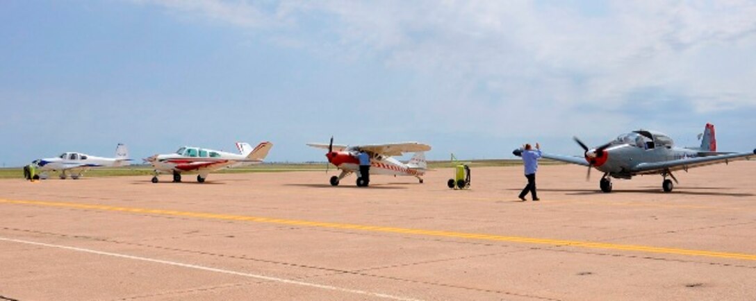 Civilian aircraft are parked on the 80th FTW parking apron upon arrival for the 80th Flying Training Wing's 'Share the Air' Civilian Fly-In June 1, 2013 at Sheppard Air Force Base, Texas. (U.S. Air Force photo/Debi Smith)