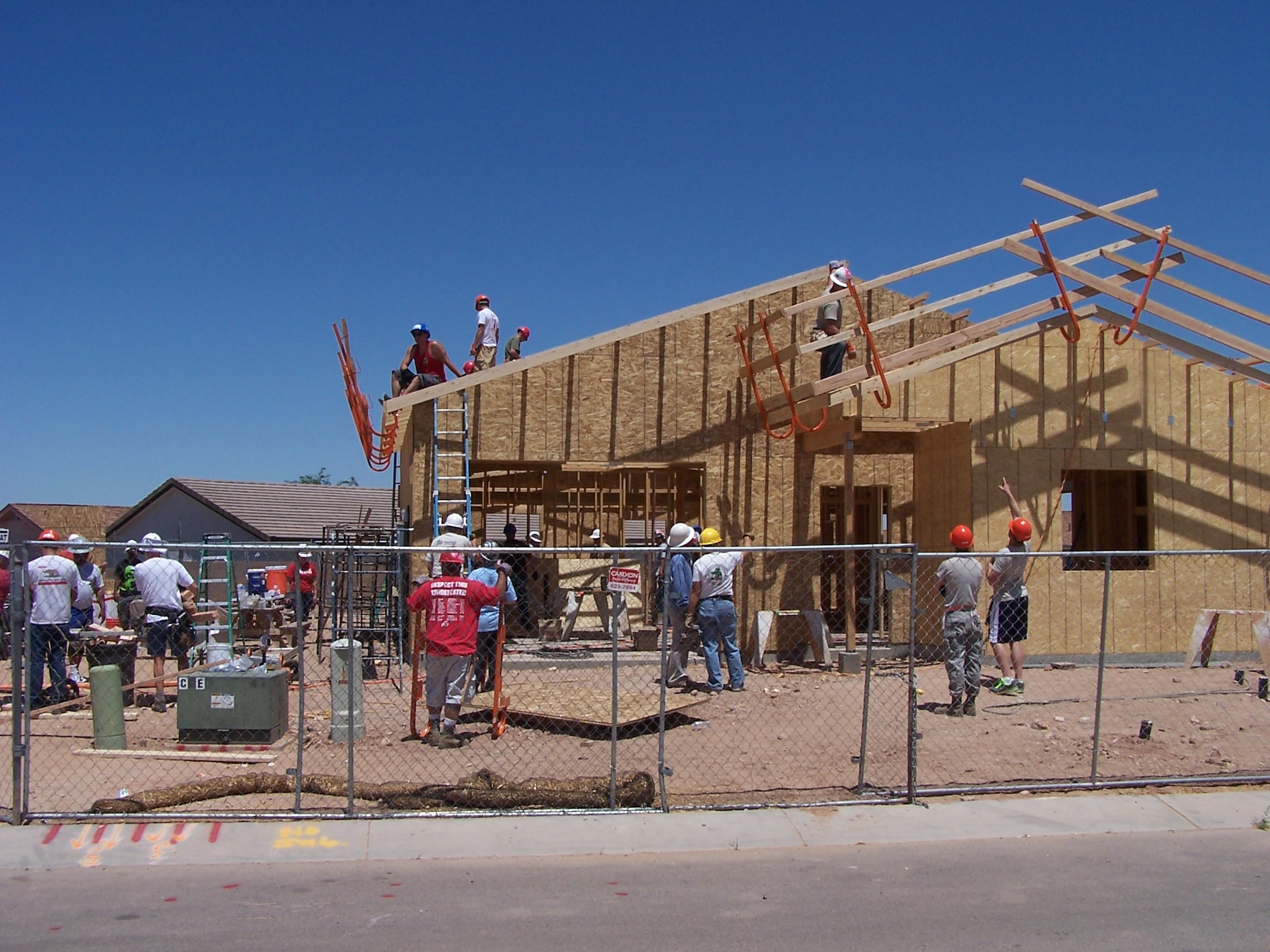 More than 30 Airmen from Davis-Monthan AFB came together to donate six hours of their off-duty time to build homes in support of the local community for Habitat for Humanity in Tucson, May 30. (Courtesy Photo/Released).