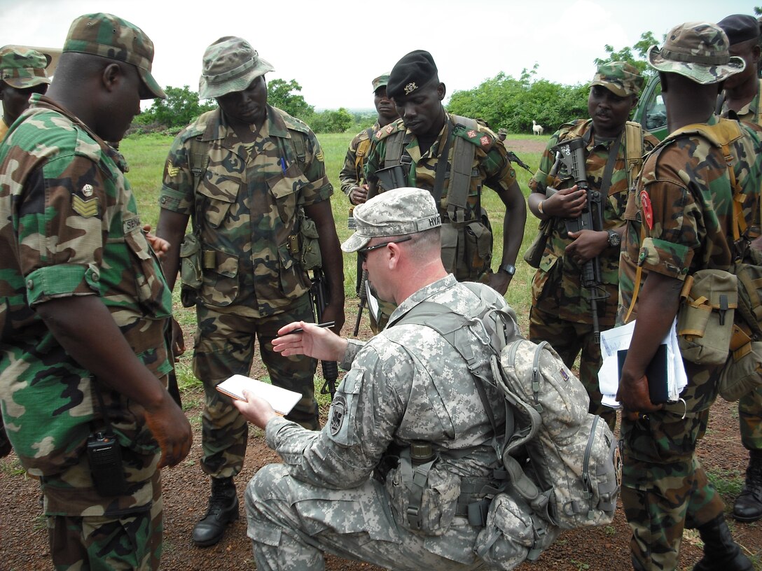 Sgt. 1st Class Grady Hyatt, with U.S. Army Africa, leads an after-action review with soldiers of the Ghana Army. Hyatt was in Africa as part of the Army's "regionally aligned forces" concept, meant to pair Army units with combatant commanders worldwide. (Army file photo)