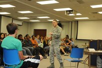 Capt. Dean Korsak, 902nd Mission Support Group Judge Advocate Office chief of military justice, cross examines a witness during a mock trial hosted May 21 at Randolph High school. The trial was hosted to raise awareness of legal professions and the military justice system.  (U.S. Air Force photo by Rich McFadden)
