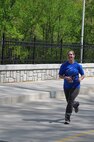 Lindsay Haig, an AEDC Hypervelocity Wind Tunnel 9 security specialist is shown here during the White Oak Classic 5K run and 2.5 mile walk at the two mile point. 