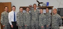 MINOT AIR FORCE BASE, N.D. -- The 5th Contracting Squadron’s Base Infrastructure Flight consists of 10 contracting professionals who are directly responsible for the solicitation, award and administration of 130 contracts valued at over $81 million annually and maintenance of 339 base structures valued at $4.1 billion in real property. As business advisors, they provide contracting insight, sound business strategies, and innovative acquisition solutions to a cross-functional team of experts from across the 5th Bomb Wing and 91st Missile Wing. (Photo courtesy of the Command Chief’s Office)