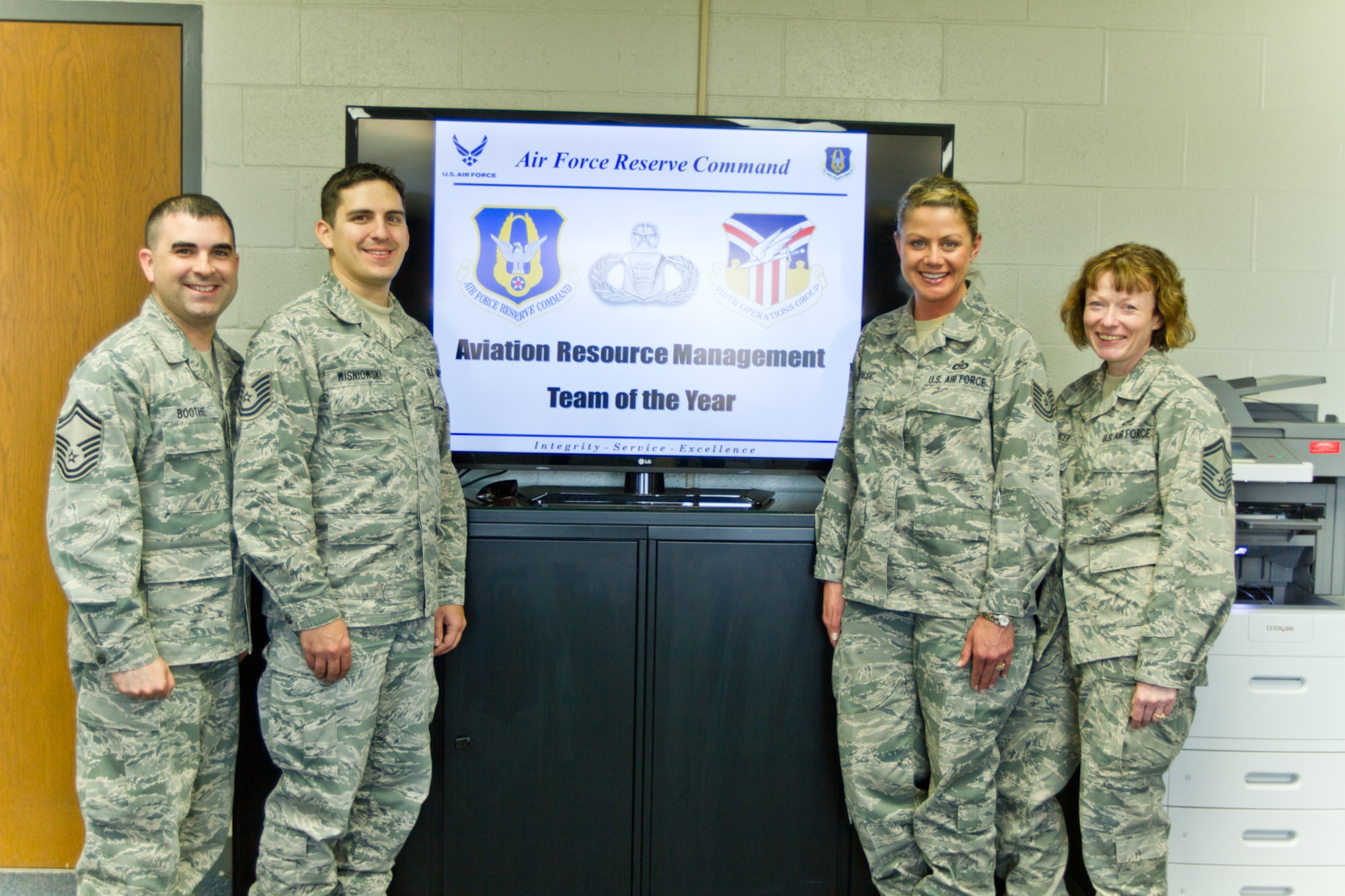 The 910th Operations Group Aviation Resource Management (ARM) team poses for a portrait. The ARM team was recently named the 2012 Sergeant Dee Campbell Outstanding Small Unit of the Year by Air Force Reserve Command. U.S. Air Force photo by TSgt. Brenda Cosola.