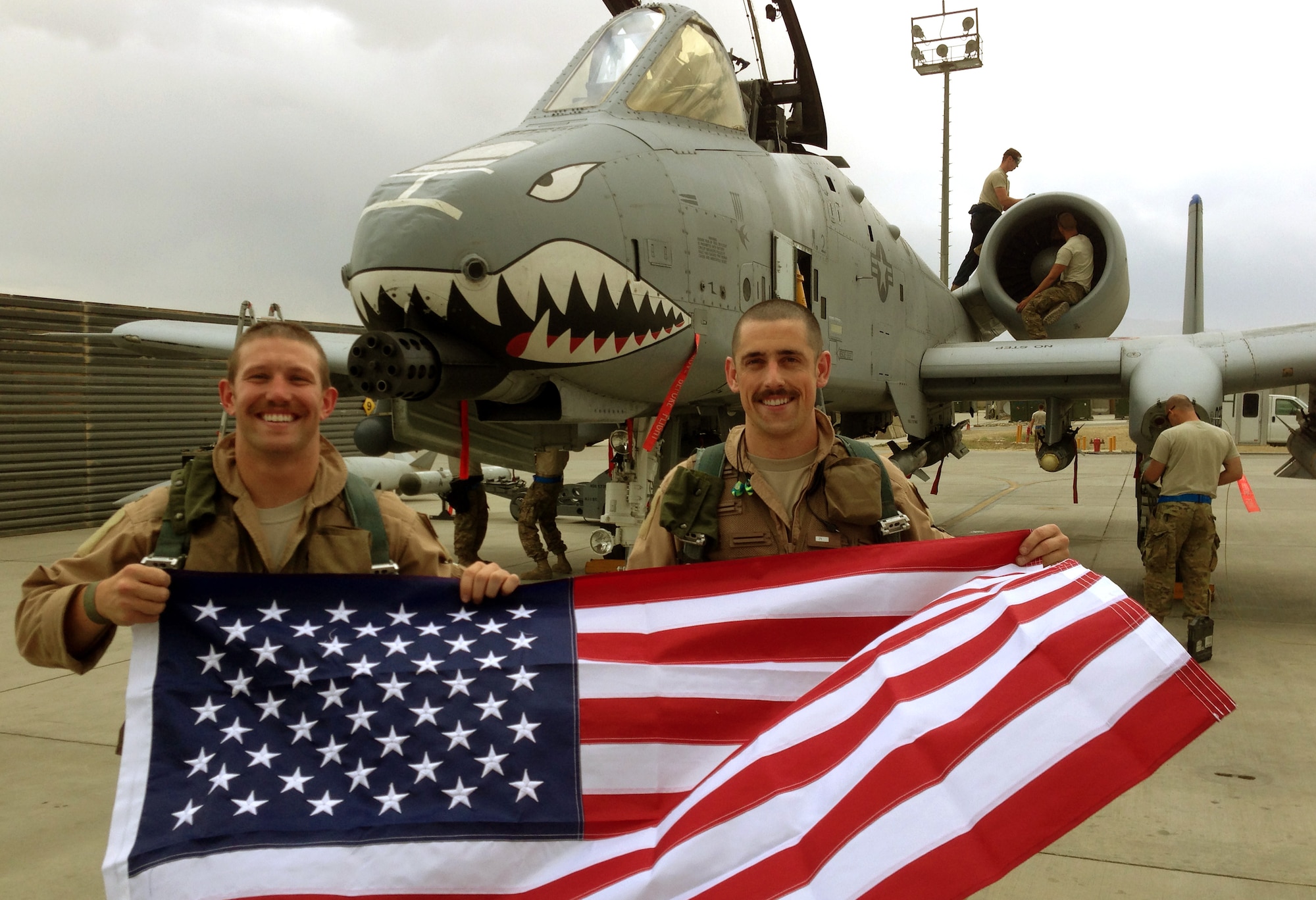 1st Lts. Mike McVay and Eli Culpepper, 74th Fighter Squadron pilots, stand in front of an A-10 Thunderbolt II after completing their first combat sortie mission together as lieutenant flight-leads at Bagram Airfield, Afghanistan May 26. The members are deployed from Moody Air Force Base, Ga. (U.S. Air Force courtesy photo) (U.S. Air Force courtesy photo)